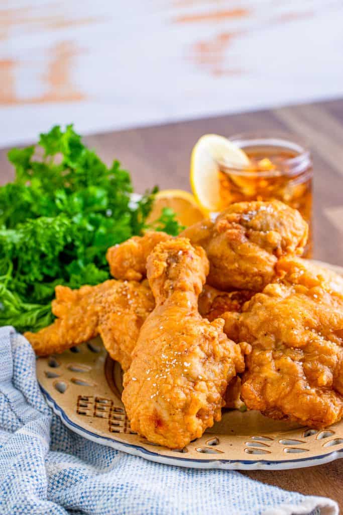 Side view of Grandma's Fried Chicken on plate.