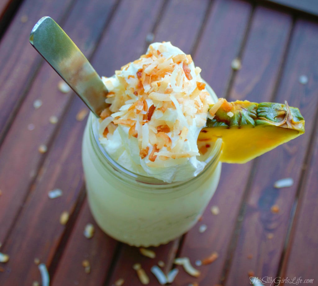 Aloha Milkshake, homemade toasted coconut & pineapple ice cream blended and topped with fresh whipped cream! - ThisSillyGirlsLife.com