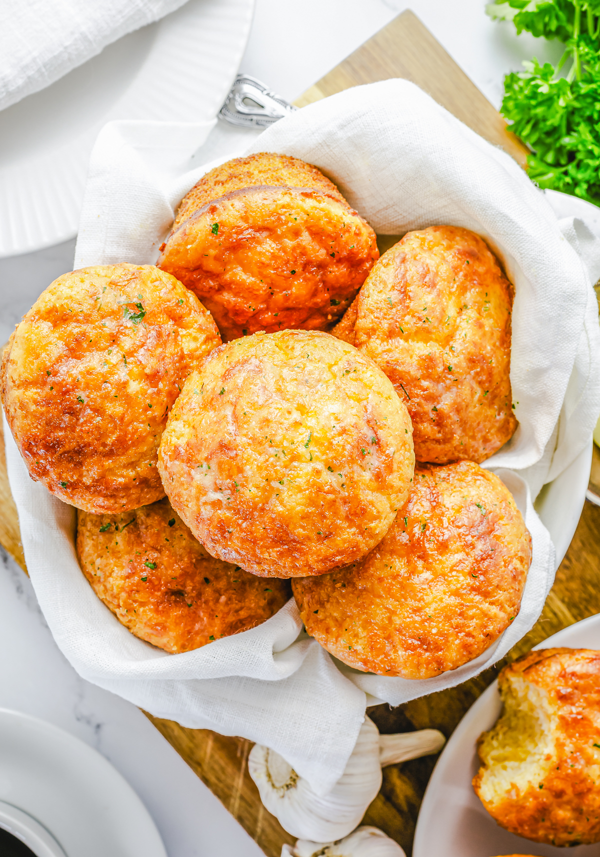 Overhead photo of Garlic Cheese Muffins in basket.