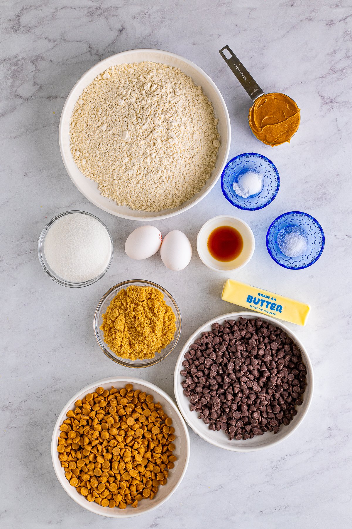 Ingredients needed to make Peanut Butter Chocolate Chip Cookie Bars.