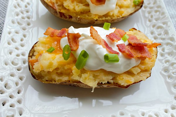 Loaded Twice Baked Potatoes, these are the best potatoes I've ever had! Great for a nice family get together, party or any day of the week! Easy, with step by step instructions, recipe from https://ThisSillyGirlsLife.com
