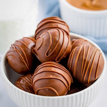 Cookie Dough Truffles in bowl stacked.