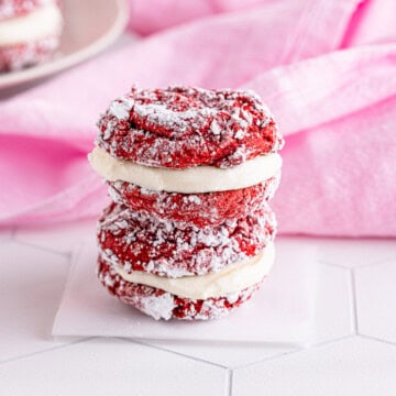 Square image of two stacked sandwich cookies.