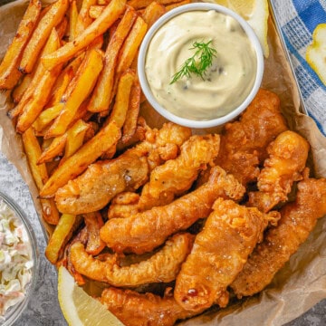 Square image of overhead finished battered fish.