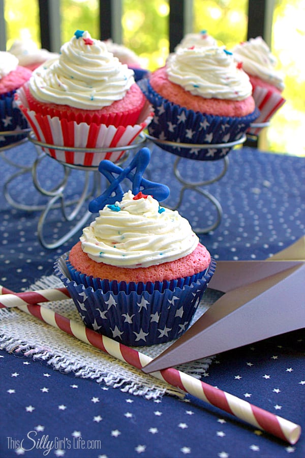 Patriotic Strawberry Cupcakes with Funfetti Frosting, light and fluffy strawberry cupcakes topped with red, white and blue funfetti vanilla buttercream!