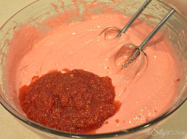 Preheat oven to 325 degrees. Mix together cake mix, jello, oil, 1/2 cup water and egg whites with hand mixer on medium speed for about 3 minutes. Scrap the sides of the bowl, add in the strawberry puree and food coloring.