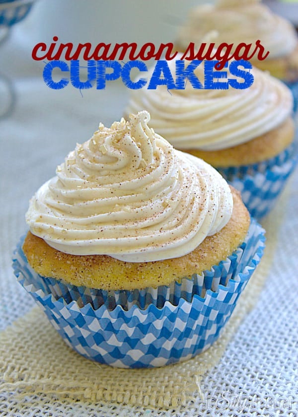 Cinnamon Sugar Cupcakes, yellow cake studded with cinnamon chips, brushed with butter and rolled in cinnamon sugar, topped with the BEST cream frosting!