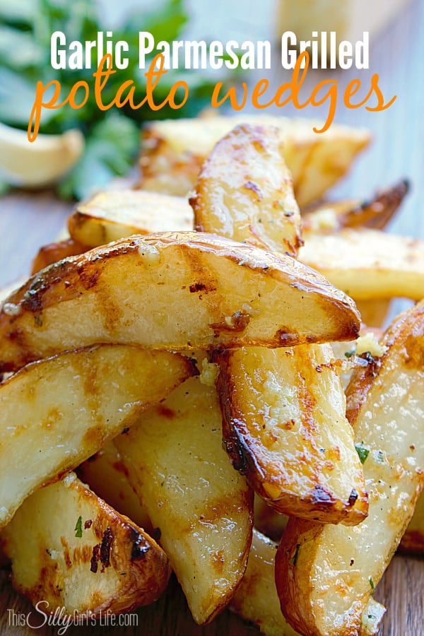 Garlic Parmesan Grilled Potato Wedges, baked then grilled and tossed in a flavorful garlic Parmesan butter sauce. Perfect for warm summer night dinners!