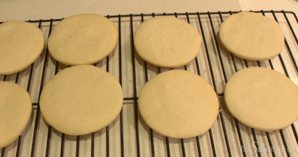 Bake for 7-8 minutes, the cookies are done if they start to turn a very light golden brown on the edges. Let cool on sheet for 5 minutes then transfer to wired rack to cool completely.