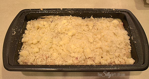 Spoon batter into 8x5 loaf pan that has been sprayed with cooking spray. In a separate bowl, add the remaining ingredients for the streusel topping, cut in the butter until it forms small pea sized chunks. Sprinkle over the bread evenly. 