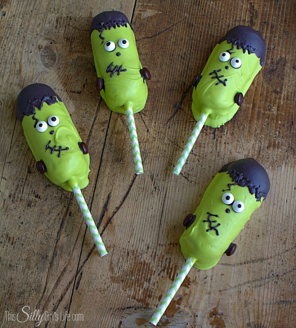 A classic favorite, Twinkies are given a #Halloween makeover with these Frankenstein Twinkies Pops! A step by step tutorial - https://www.ThisSillyGirlsLife.com