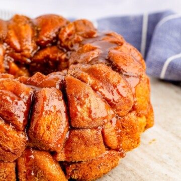 Finished Pumpkin Monkey Bread on wooden platter.