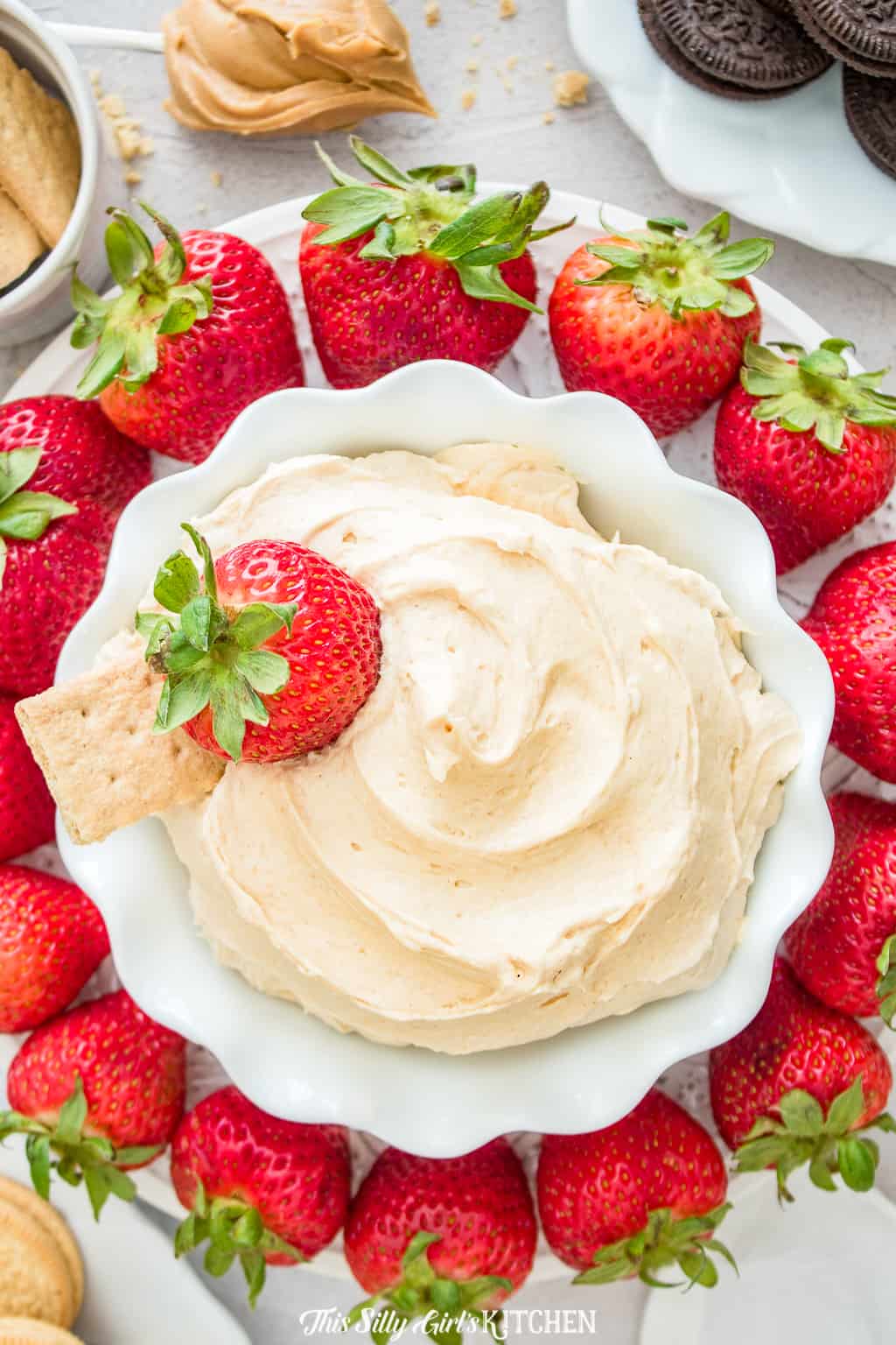 Fluffernutter Dip overhead in bowl with strawberries
