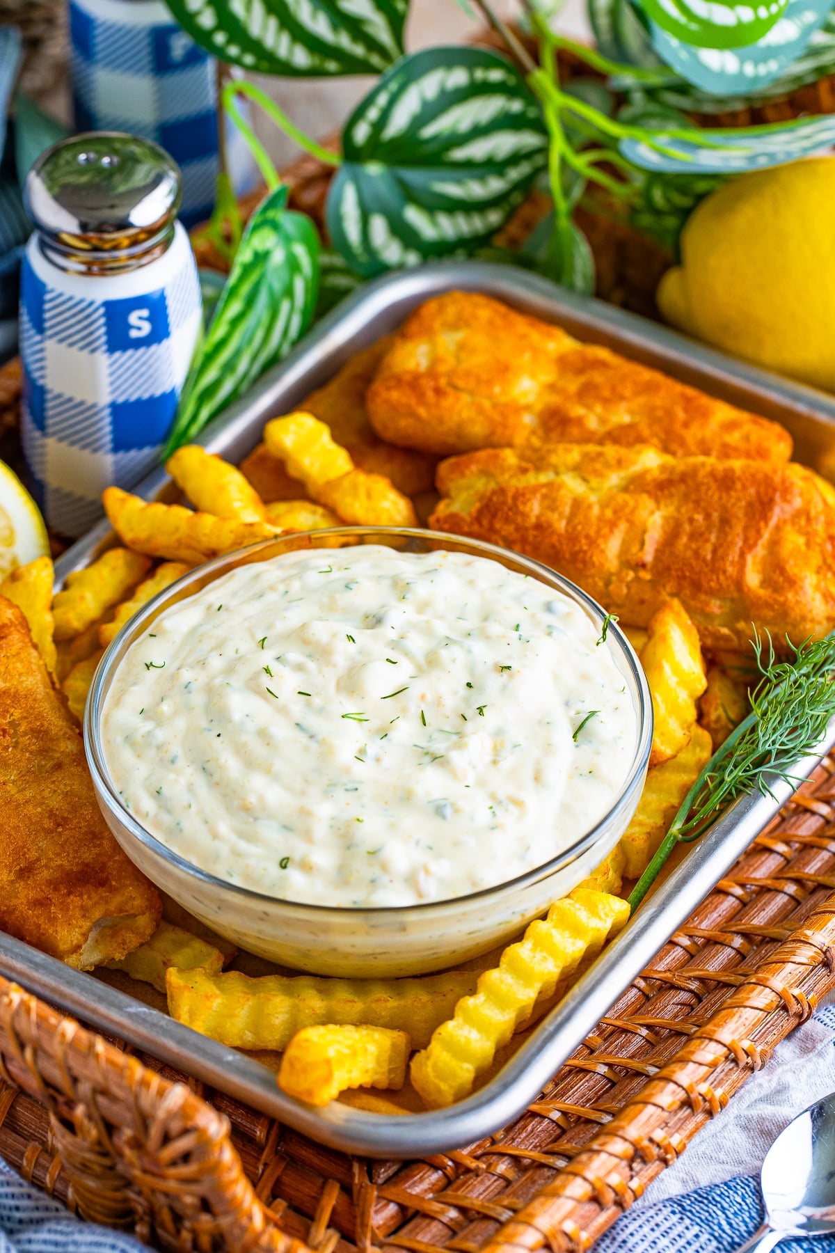 Easy Homemade Tartar Sauce, mayo mixed with pickle relish and spices, so much better than store bought! - ThisSillyGirlsLife.com fish and chips served on a tray with easy tartar sauce
