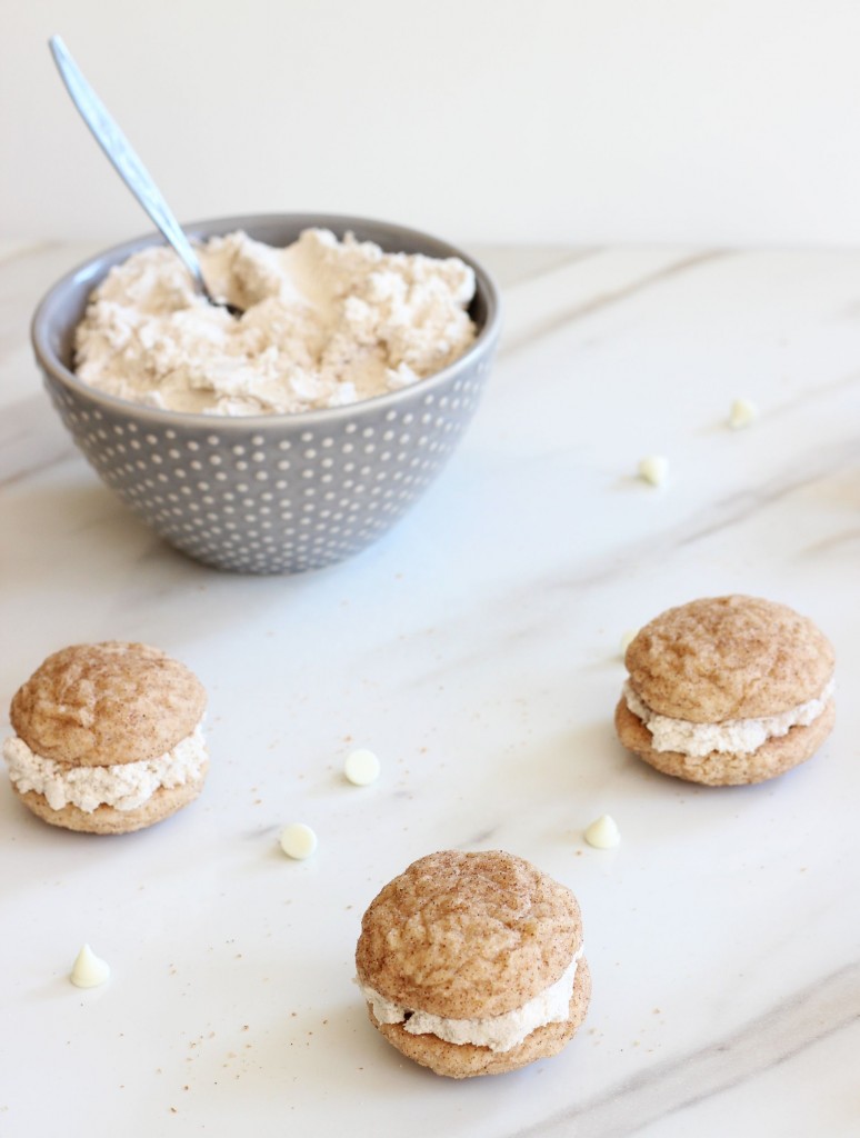 Snickerdoodle Cookiewiches, fluffy white chocolate cinnamon frosting sandwiched between two light but decadent snickerdoodles, a twist on the classic spiced cookie!