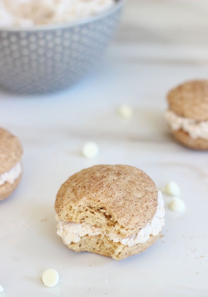 Snickerdoodle Cookiewiches, fluffy white chocolate cinnamon frosting sandwiched between two light but decadent snickerdoodles, a twist on the classic spiced cookie!