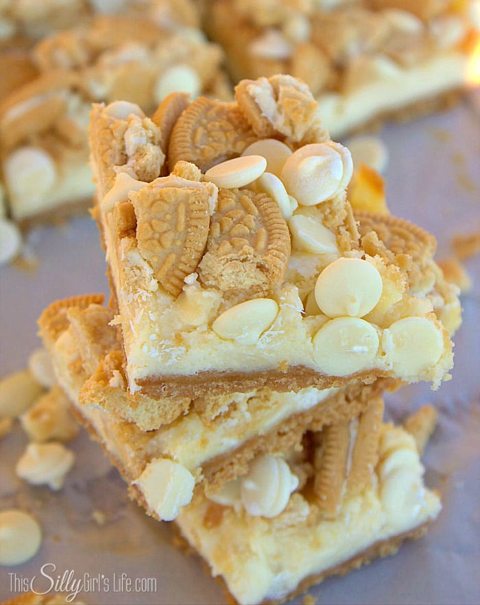 Golden Oreo White Chocolate Cheesecake Bars, golden Oreo crust with a smooth cheesecake filling studded with white chocolate chips! - ThisSillyGirlsLife.com