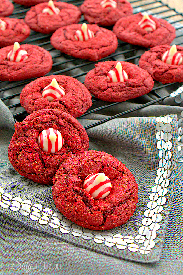 Candy Cane Red Velvet Blossom Cookies, soft and chewy cake mix cookies decorated with candy cane kisses! - ThisSillyGirlsLife.com #BlossomCookies