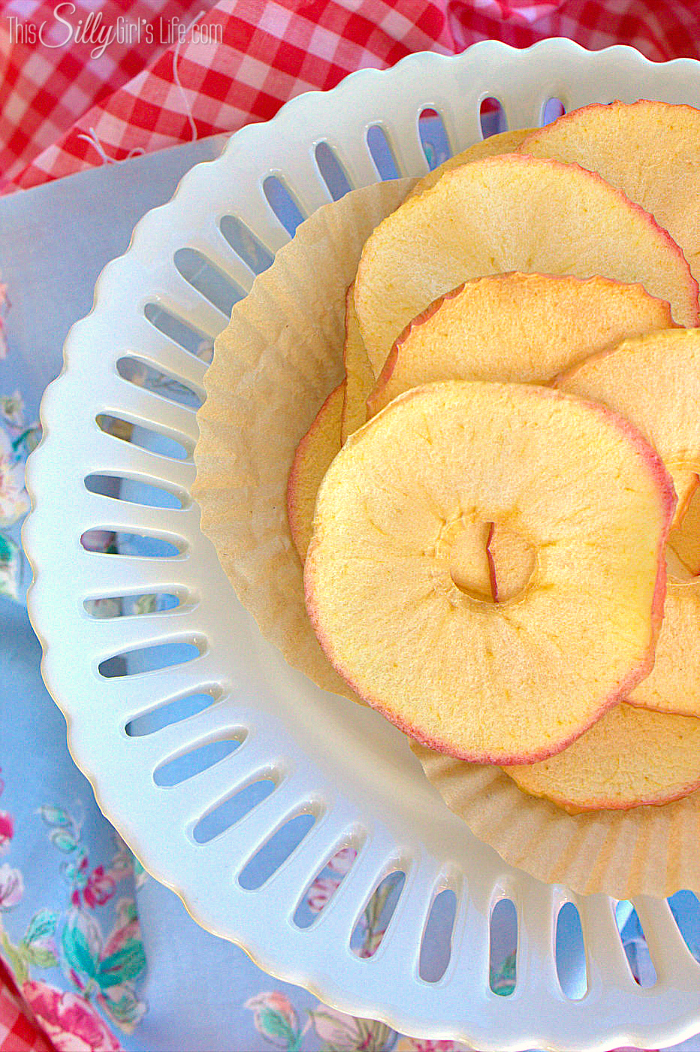 Baked Honey Crisp Apple Chips, thinly sliced and baked to a crispy, delicious, sweet and healthy snack! - ThisSillyGirlsLife.com 