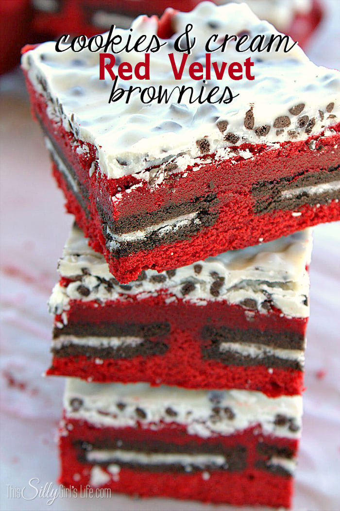 Cookies and Cream Red Velvet Brownies, Oreo stuffed homemade red velvet brownies, topped with cookies and cream kisses! - ThisSillyGirlsLife.com #RedVelvetBrownies