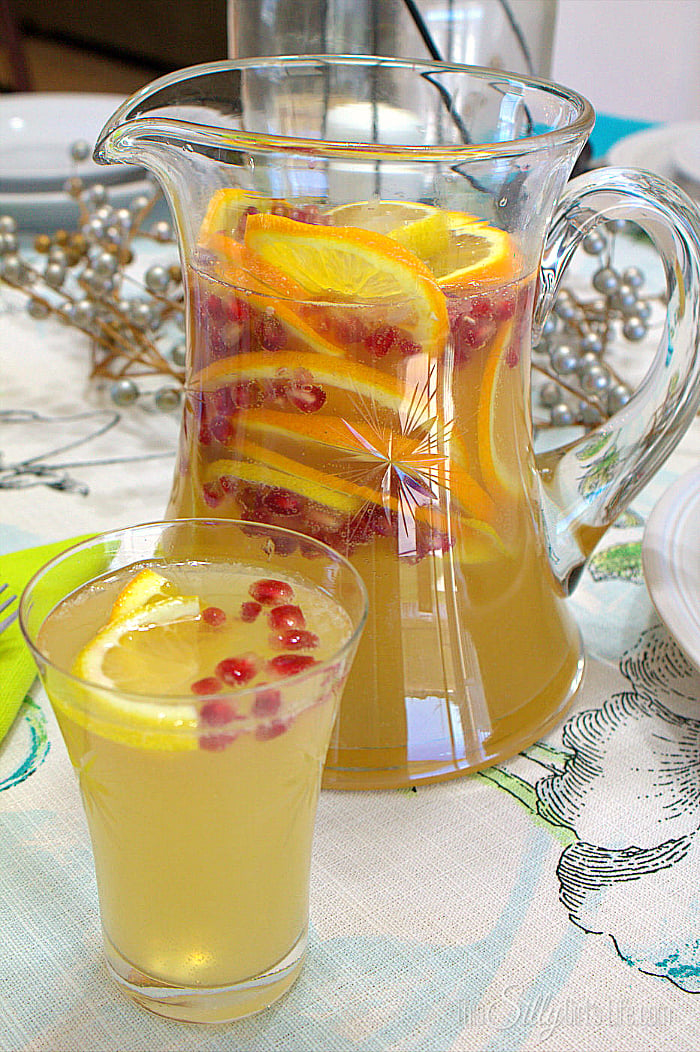 Sparkling Citrus Pomegranate Punch, a non-alcoholic punch, bubbly and refreshing with citrus notes and pops of pomegranate! - ThisSillyGirlsLife.com #SparklingPunch