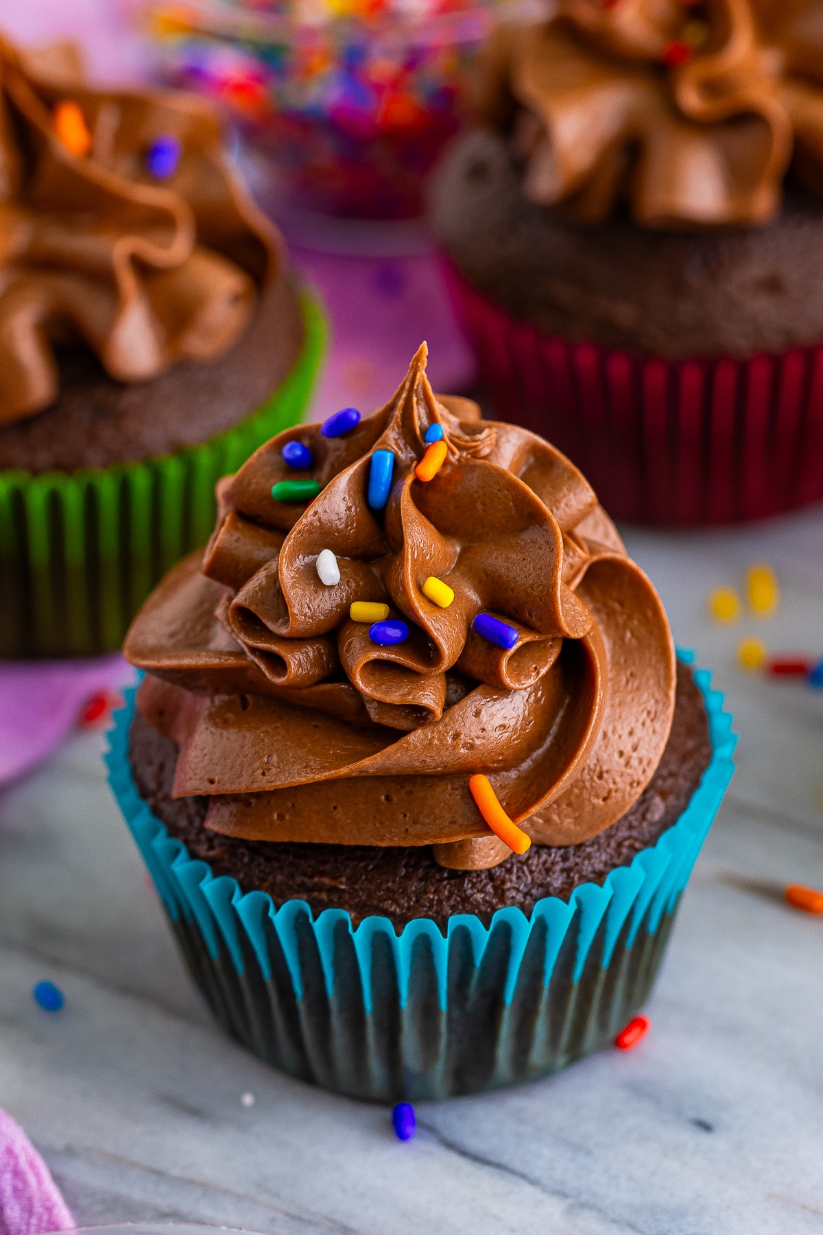 a chocolate cupcake with Chocolate Buttercream Frosting on top