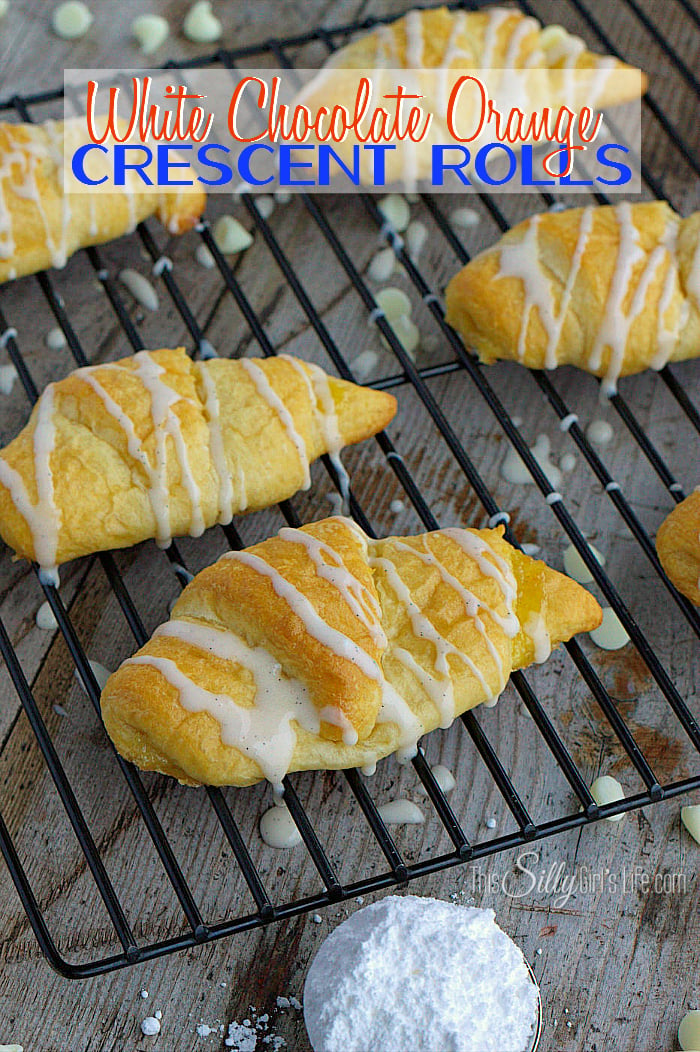 White Chocolate Orange Crescent Rolls, crescent rolls smeared with orange curd and stuffed with white chocolate chips, baked and drizzled with a vanilla bean glaze. - ThisSillyGirlsLife.com