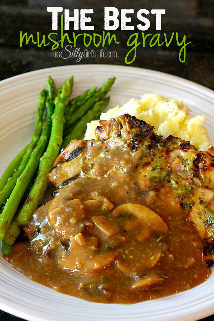 The Best Mushroom Gravy, button mushrooms, roasted garlic and herbs makes this gravy a knock out! - ThisSillyGirlsLife.com #MushroomGravy