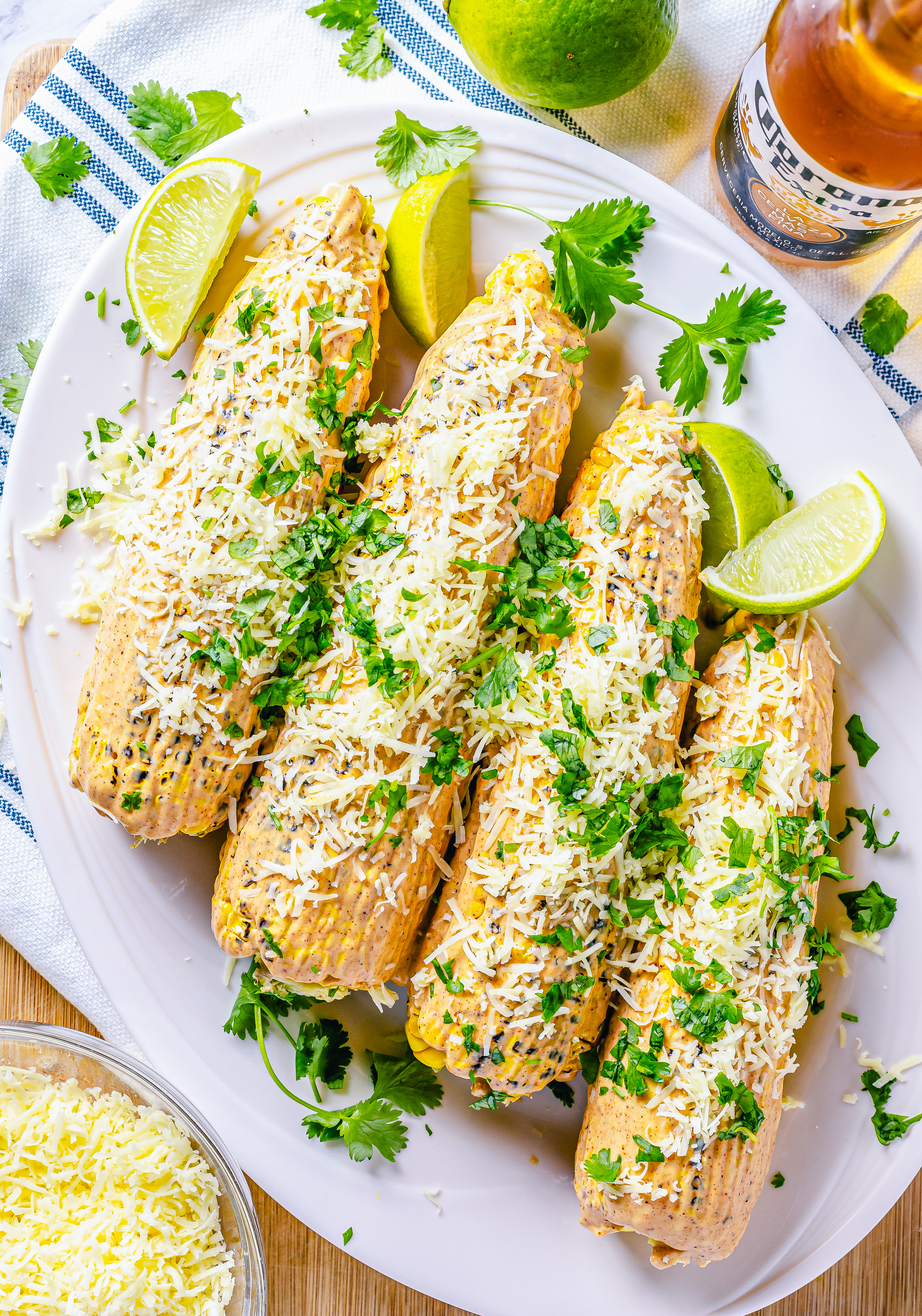 Overhead of finished Mexican Street Corn on white platter