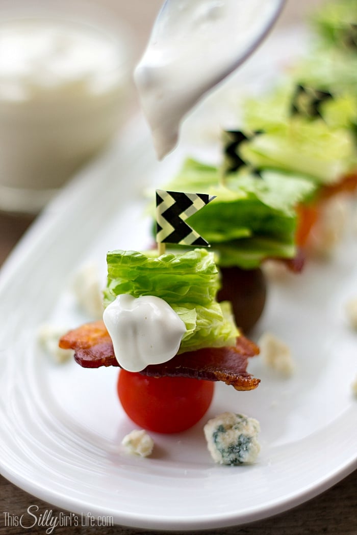 Wedge Salad Bites, the classic salad in bite size, with homemade blue cheese dressing! - ThisSillyGirlsLife.com #wedgesalad #bluecheesedressing #appetizer