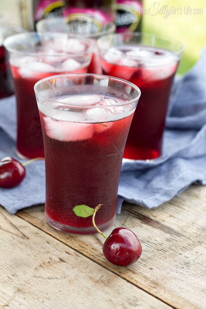 Black Cherry Sangria, fresh cherries, pineapple juice and Mike's Hard Black Cherry Lemonade, this sangria is sweet, refreshing and bursting with summer flavors! - ThisSillyGirlsLife.com #ad #mikesbackyard #mikesVIP