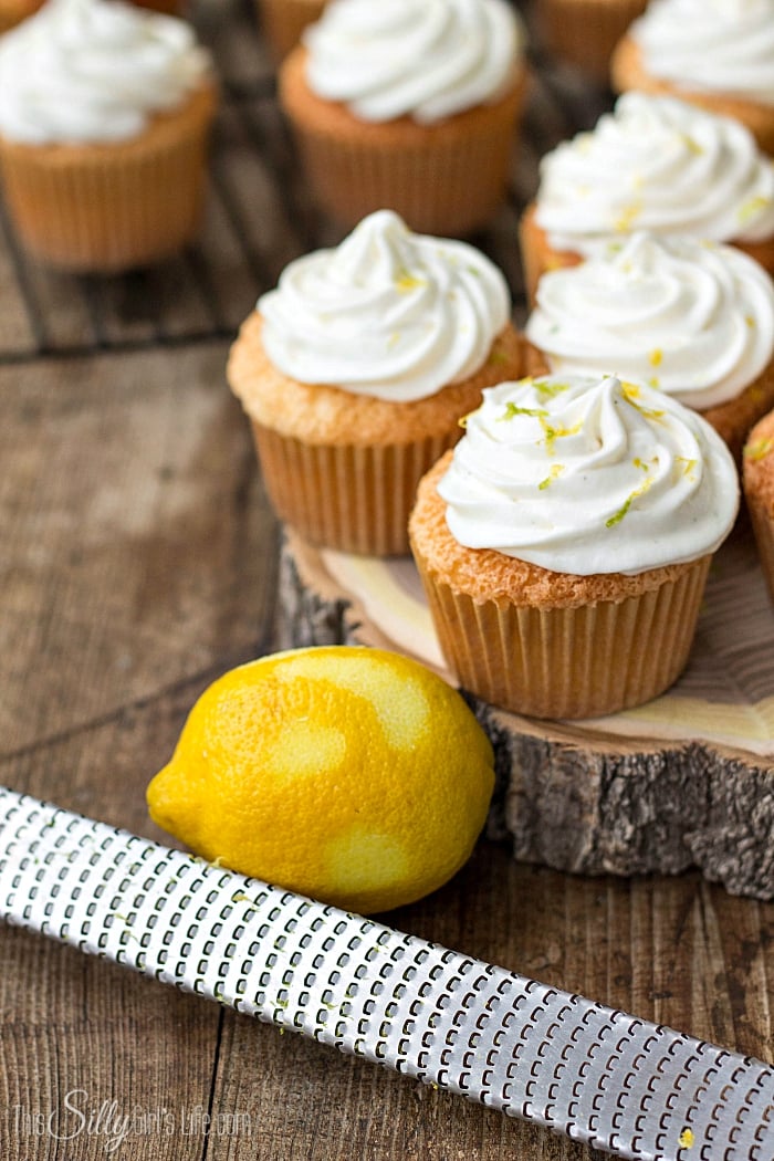 Lemon Lime Angel Food Cupcakes, light as air homemade angel food cupcakes and whipped frosting, flavored with lemon and lime zest! - ThisSillyGirlsLife.com #angelfood #whippedfrosting #lemonlime