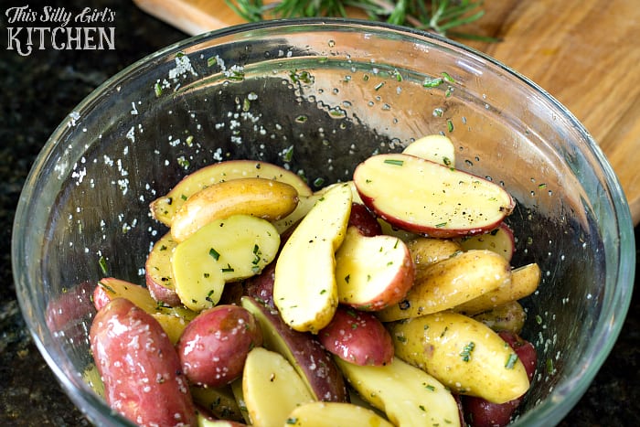 Rosemary Roasted Fingerling Potatoes, a beautiful, flavorful side dish for Thanksgiving, or any night of the week! from ThisSillyGirlsLife.com #thanksgiving #thanksgivingrecipes #roastedpotatoes