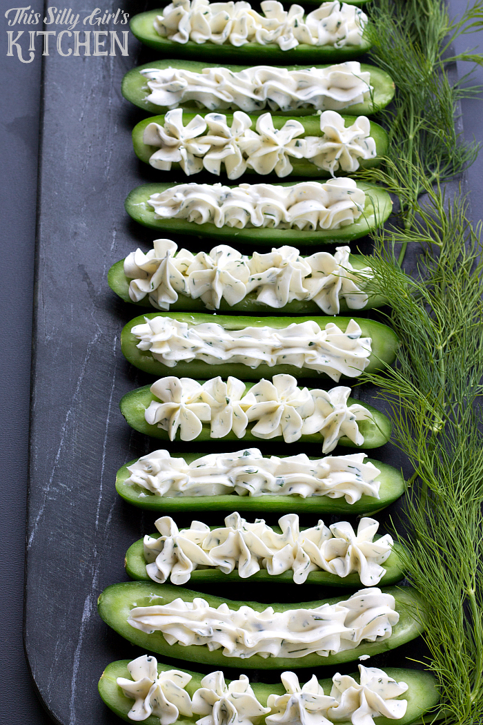 Dill Cream Cheese Cucumber Boats, mini cucumbers stuffed with homemade flavored cream cheese, a great party app or snack! from ThisSillyGirlsLife.com