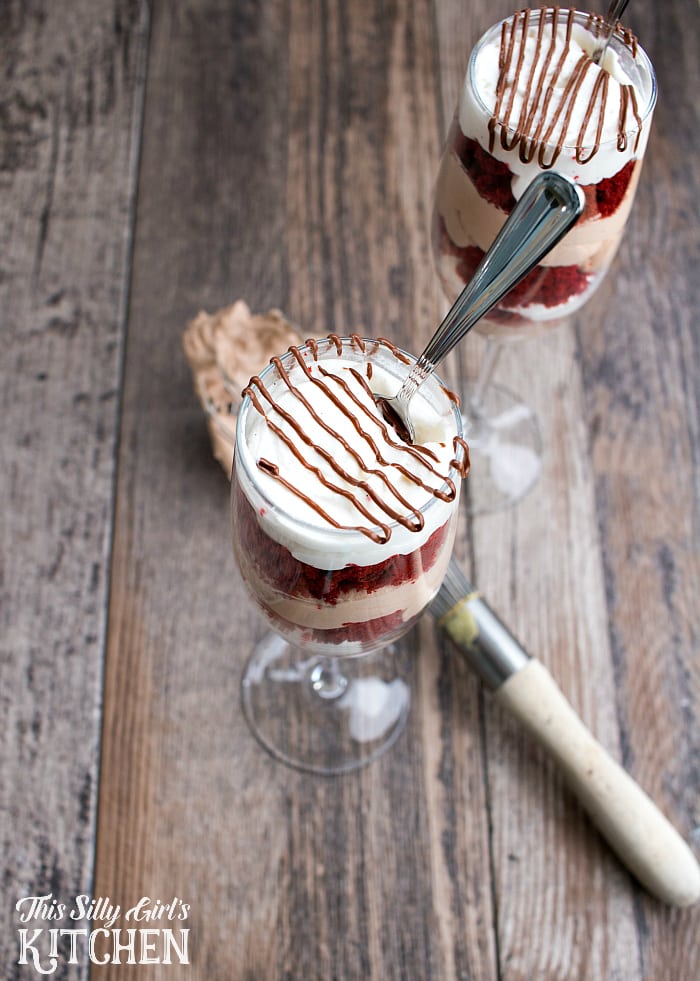 Red Velvet Nutella Trifle, red velvet cake and homemade Nutella whipped cream make this a show stopping dessert! from ThisSillyGirlsLife.com #nutella #redvelvet