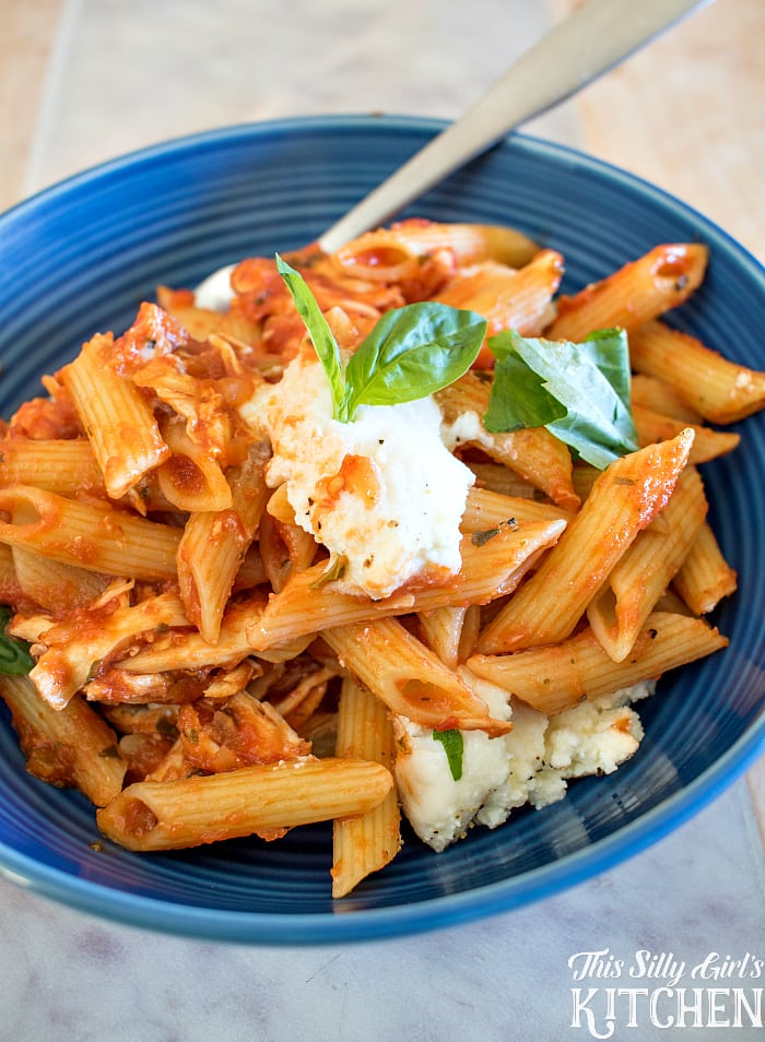 Creamy Chicken Fra Diavolo, rotisserie chicken, basil and dollops of ricotta in a spicy tomato sauce with penne make this a show-stopping weeknight meal! from ThisSillyGirlsLife.com #BarillaOrganic #BarillaMarinara #ad