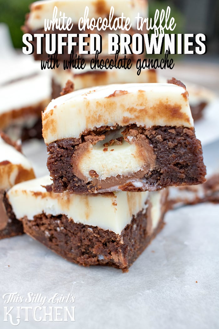 White Chocolate Truffle Stuffed Brownies, irresistible fudgy brownies stuffed with truffles and topped with a thick layer of white chocolate ganache, a chocolate lover's dream! from ThisSillyGirlsLife.com #stuffedbrownies 