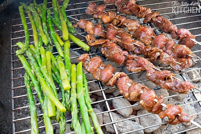 Asian Steak Skewers, flank steak sliced thinly, marinated in a hoisin sauce, skewered and grilled over charcoal! Super tender and extremely flavorful. from ThisSillyGirlsLife.com #KingsfordProfessional #ad