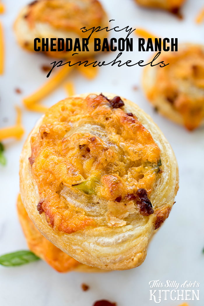 Spicy Cheddar Bacon Ranch Pinwheels, crispy puffed pastry bites, made with Sriracha Ranch for a little kick! from ThisSillyGirlsLife.com @HVRanch #RanchEverything Sponsored by Hidden Valley