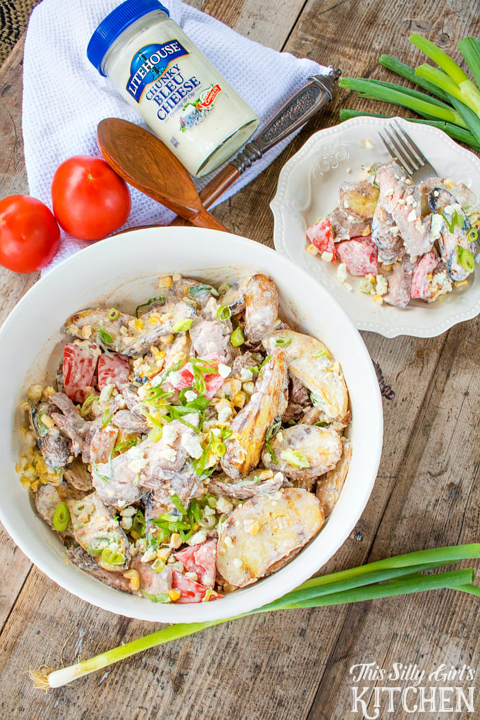 Black and Bleu Potato Salad, blackened flank steak is mixed with grilled potatoes and corn, coated in a luscious bleu cheese dressing! from ThisSillyGirlsLife.com SeeTheLite AD