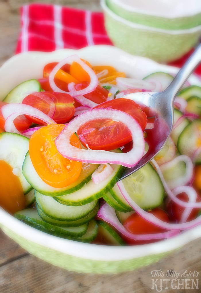 Tomato, Cucumber and Onion Salad, bright, refreshing and perfect for summer! from ThisSillyGirlsLife.com
