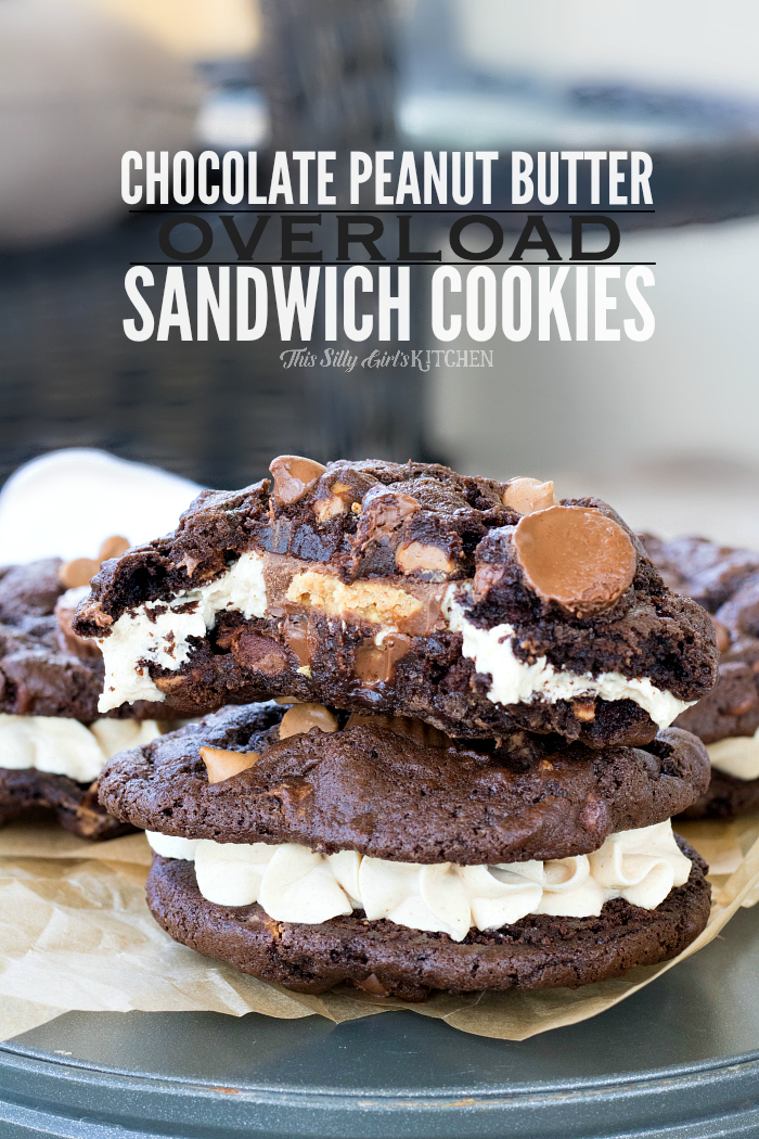 Chocolate Peanut Butter Overload Sandwich Cookies stacked with bite taken out of one.