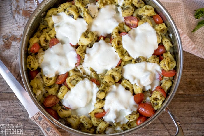 30 Minute One Pot Caprese Tortellini Bake, have dinner on the table in 30 minutes with this epic baked pasta dish! from ThisSillyGirlsKitchen.com #BarillaPesto #BJsWholesale #BarillaTortellini #ad @BarillaUS