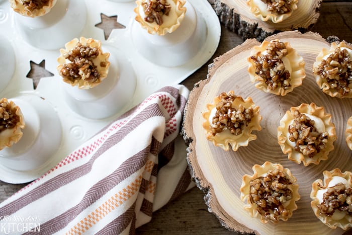 Creamy Baklava Bites on wooden stand and upside down muffin tin