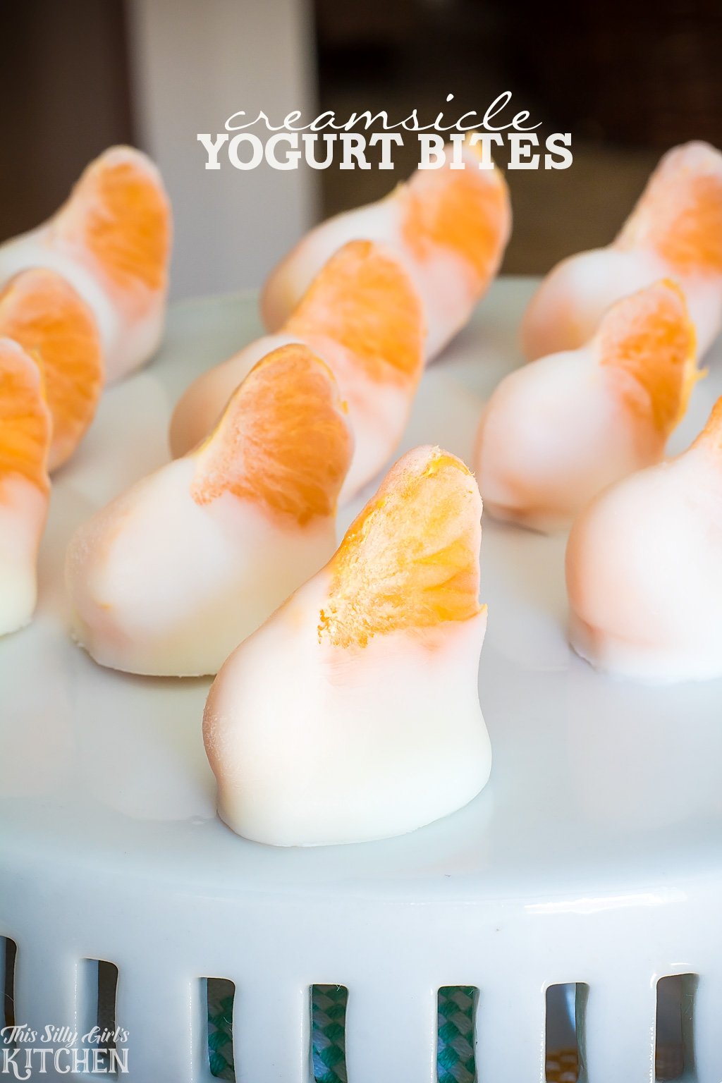 Creamsicle Yogurt Bites, clementines dipped in vanilla yogurt and frozen for a fun, healthy snack! from ThisSillyGirlsKitchen.com AD