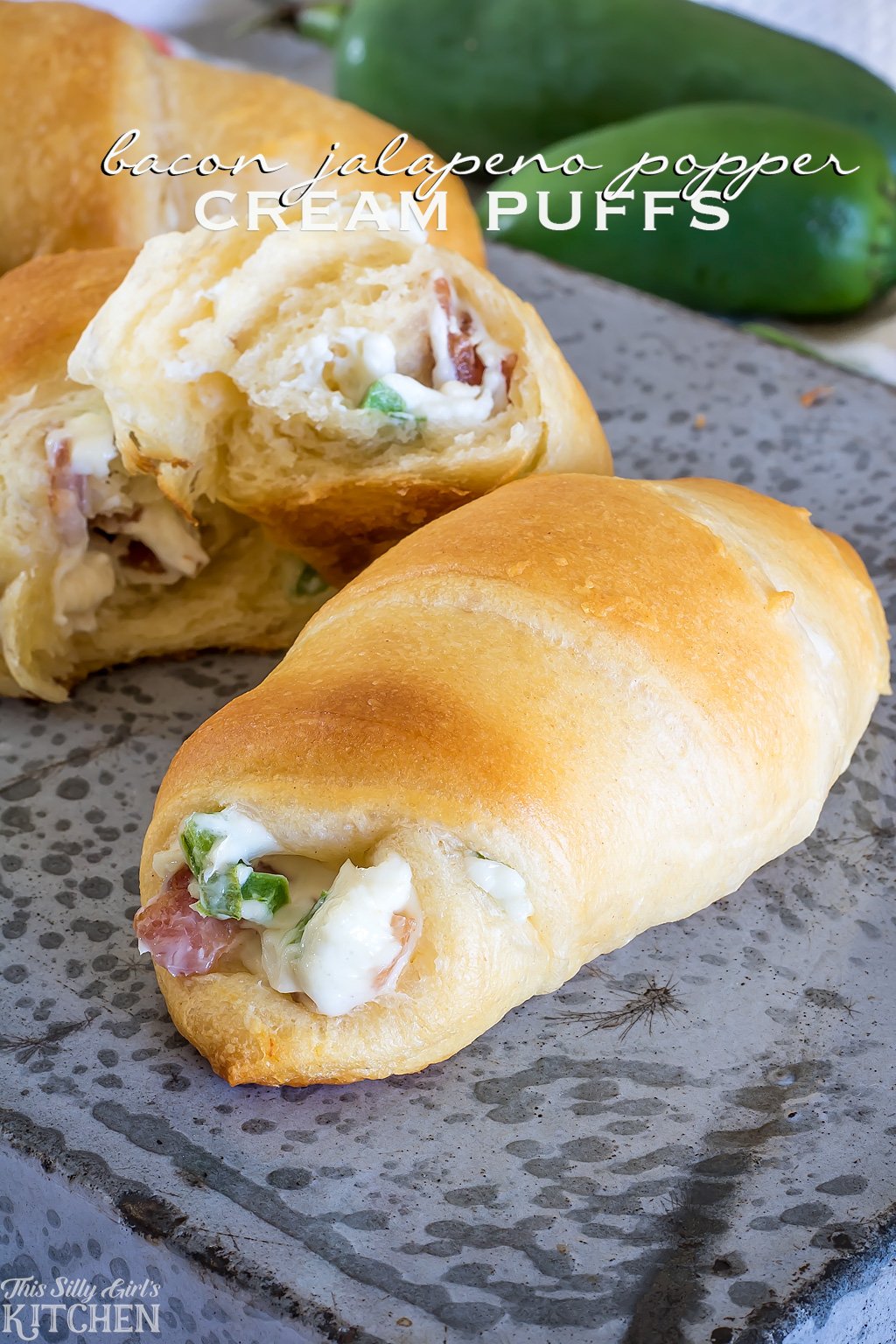 AD Bacon Jalapeno Popper Cream Puffs, jalapenos, bacon, and cream cheese stuffed in crescents rolls and baked. from ThisSillyGirlsKitchen.com #LoveThisHolidayTwist