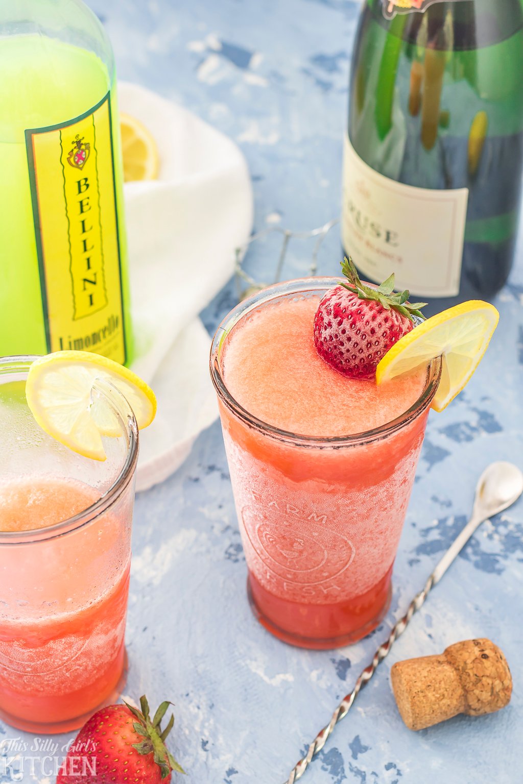 Strawberry Limoncello Slush, a refreshing adult slushie perfect for summer! Recipe from ThisSillyGirlsKitchen.com @TotalWine #totalwine