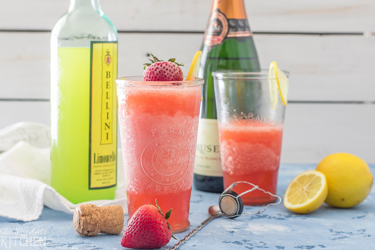 Strawberry Limoncello Slush, a refreshing adult slushie perfect for summer! Recipe from ThisSillyGirlsKitchen.com @TotalWine #totalwine