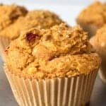 A Pumpkin Muffin studded with fresh cranberries and topped with sparkling coarse sugar.