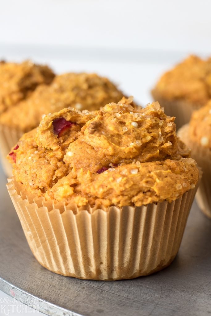 Cranberry Pumpkin Muffins, loaded with fresh cranberries, Honeycrisp apples, and of course, pumpkin! Simple, easy, and delicious! Recipe from ThisSillyGirlsKitchen.com